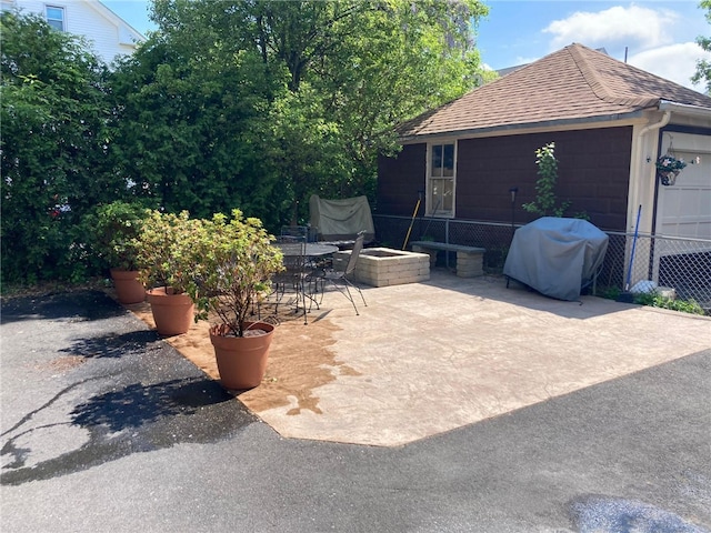 view of patio featuring a grill