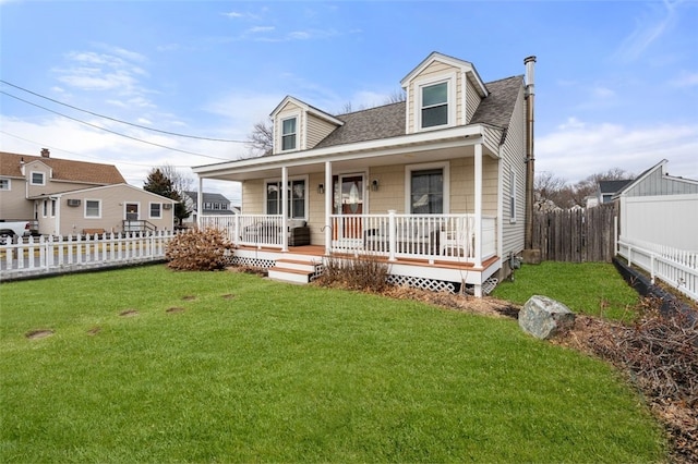 view of front facade featuring a front lawn and a porch