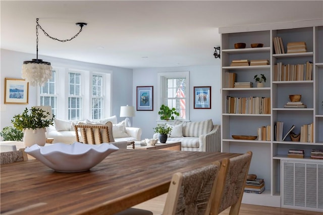 sitting room featuring wood-type flooring