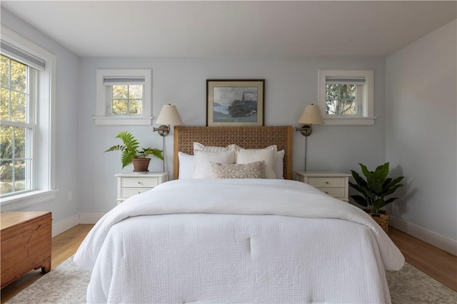 bedroom featuring light wood-type flooring