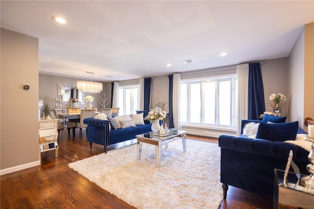 living room featuring dark hardwood / wood-style floors