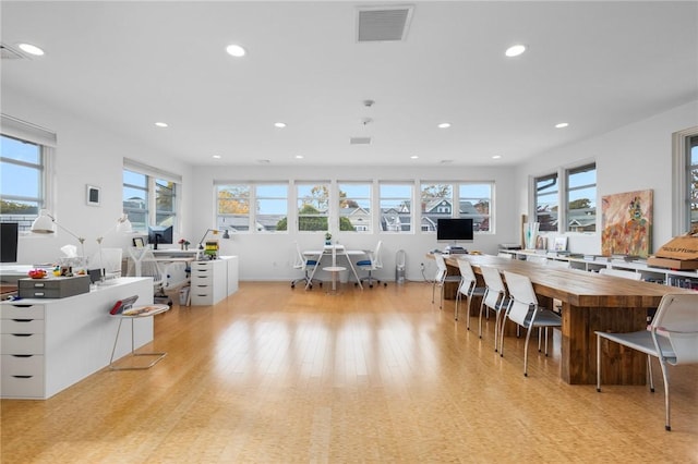 dining space featuring light hardwood / wood-style floors