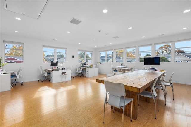 dining area featuring light wood-type flooring