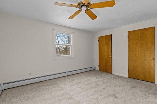 unfurnished bedroom featuring light carpet, ceiling fan, and baseboard heating