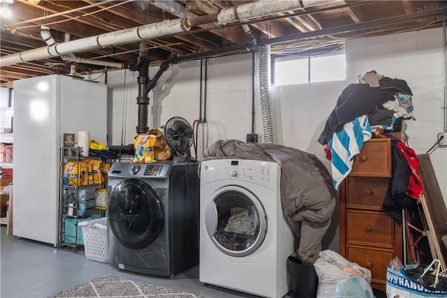 laundry room with laundry area and washing machine and dryer