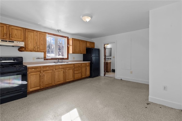 kitchen with sink and black appliances