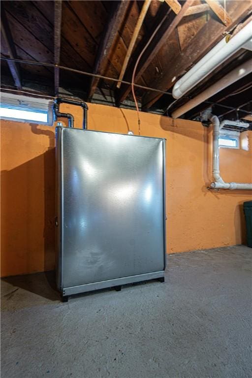 basement featuring refrigerator