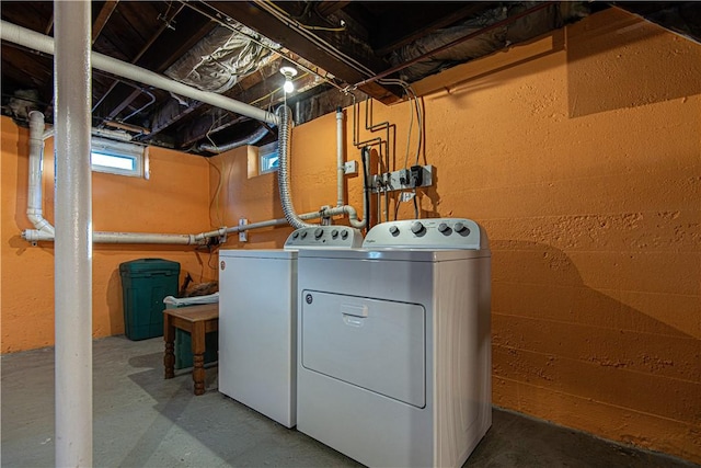 washroom featuring washer and clothes dryer