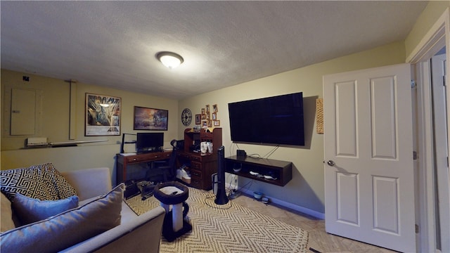 office featuring a textured ceiling and baseboards