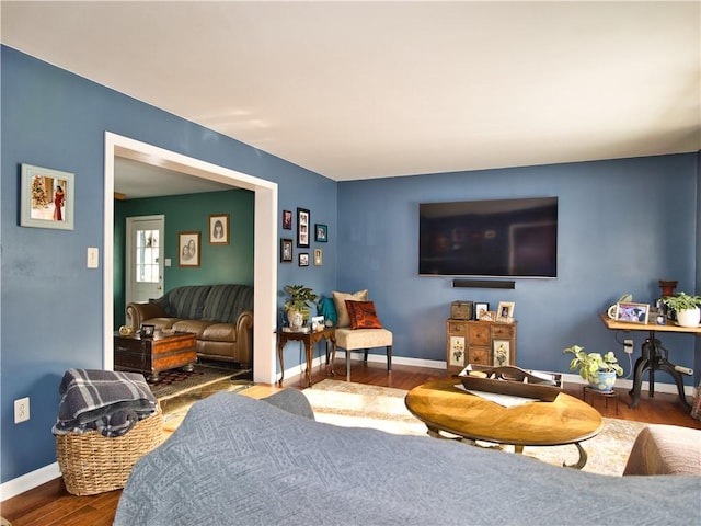 living room featuring dark hardwood / wood-style flooring