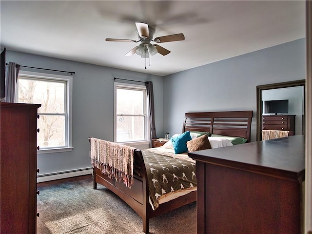 bedroom with carpet floors, a baseboard radiator, and ceiling fan