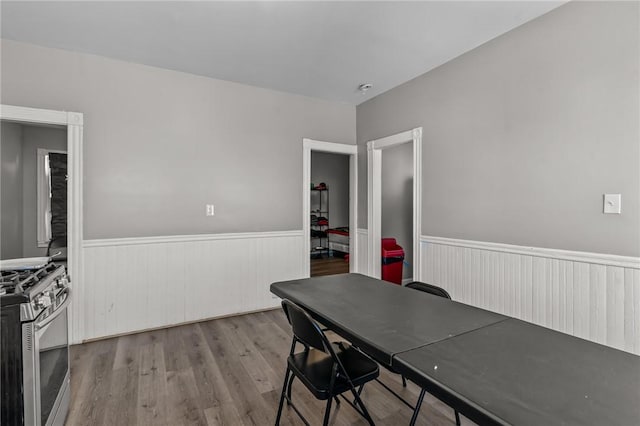 dining space featuring hardwood / wood-style flooring