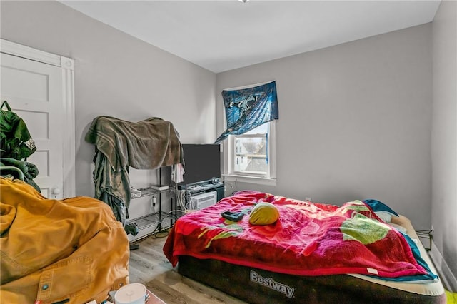 bedroom featuring light hardwood / wood-style flooring