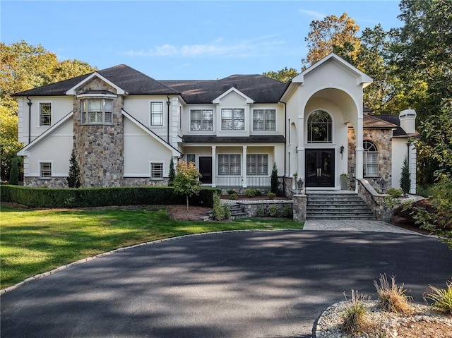 view of front of house with a front lawn