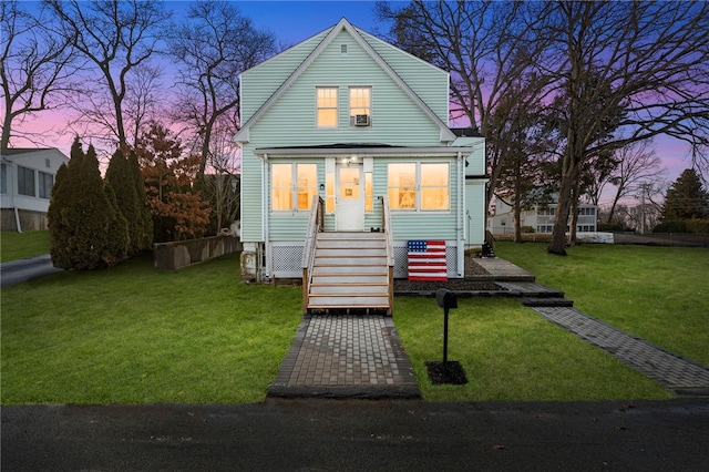 view of front of home featuring a yard