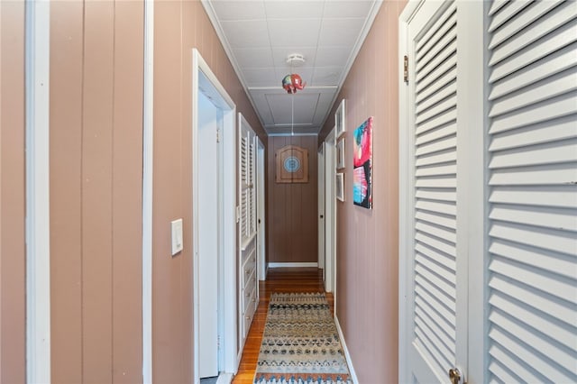 corridor featuring ornamental molding