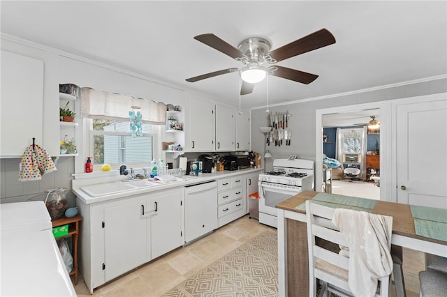 kitchen with sink, white cabinets, ceiling fan, crown molding, and white appliances