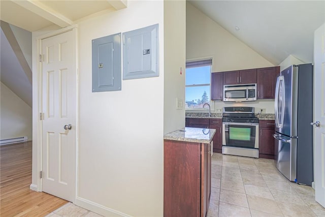 kitchen featuring a baseboard radiator, stainless steel appliances, electric panel, and light stone countertops