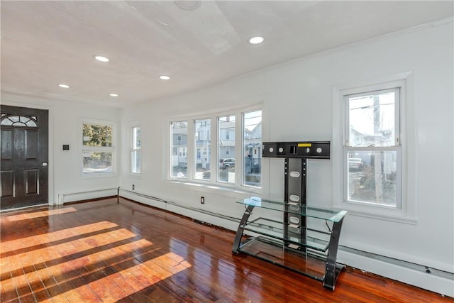 exercise room featuring dark wood-type flooring