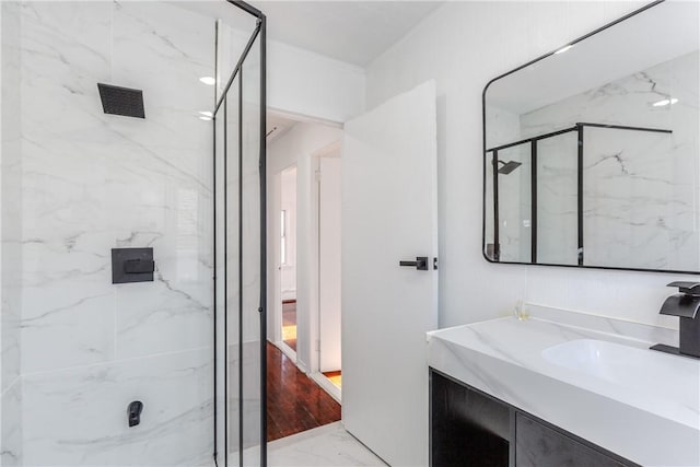 bathroom with vanity and walk in shower