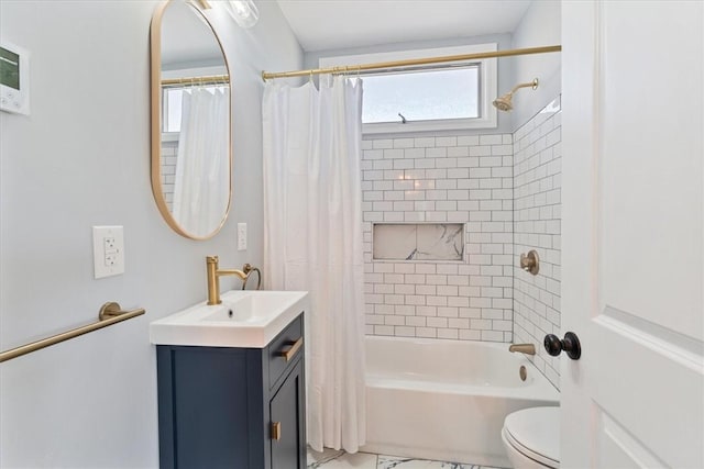 full bathroom with vanity, toilet, and shower / tub combo