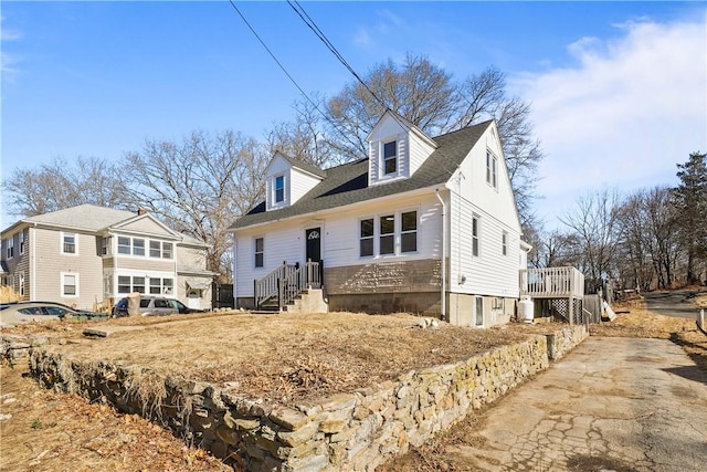 view of new england style home