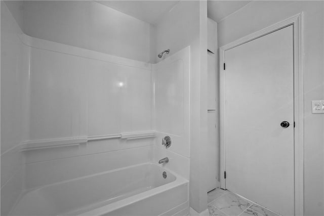 bathroom with washtub / shower combination