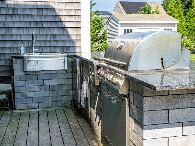 view of patio featuring exterior kitchen