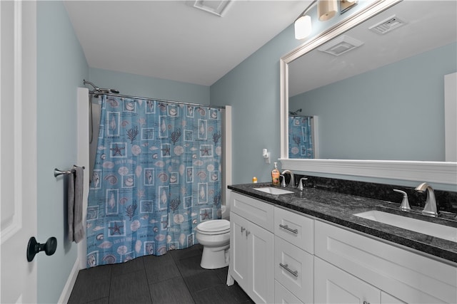 full bathroom with shower / bathtub combination with curtain, tile patterned floors, vanity, and toilet