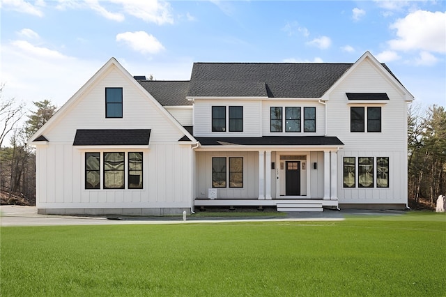 modern farmhouse style home featuring a front lawn