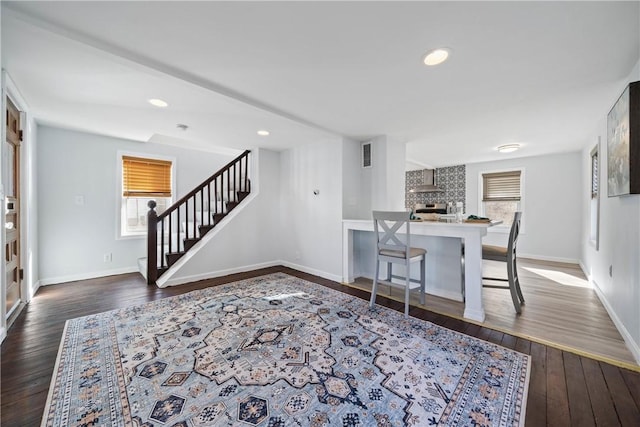 interior space with dark hardwood / wood-style floors