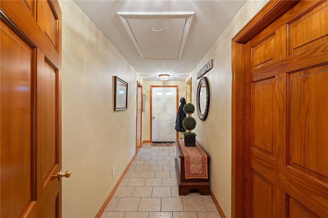 hallway featuring light tile patterned floors