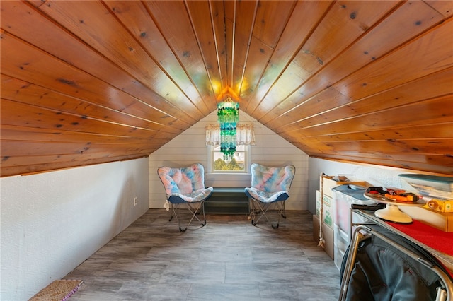 additional living space featuring vaulted ceiling and wooden ceiling