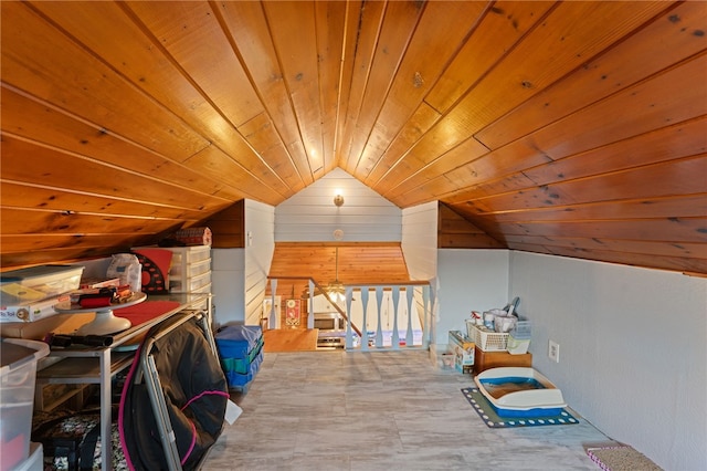 bonus room with vaulted ceiling and wood ceiling