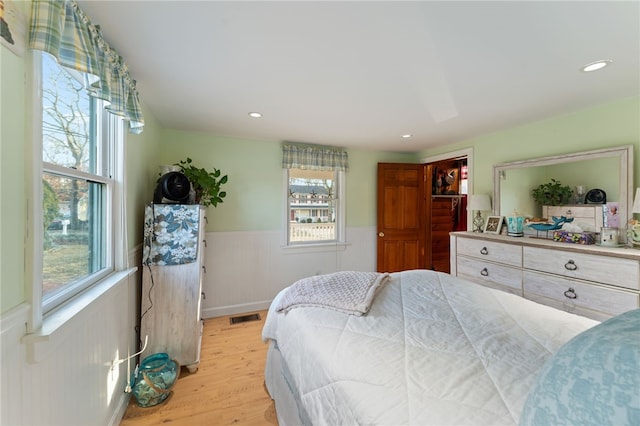 bedroom featuring light hardwood / wood-style floors