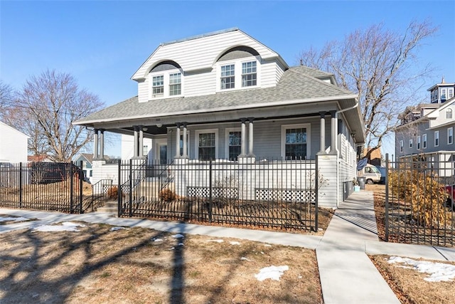 view of front of home featuring covered porch