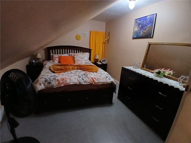 bedroom featuring lofted ceiling