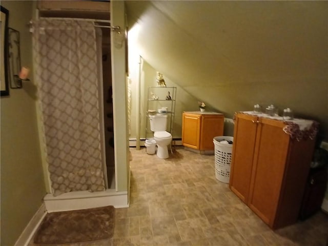 bathroom with vaulted ceiling, baseboard heating, toilet, and a shower with shower curtain