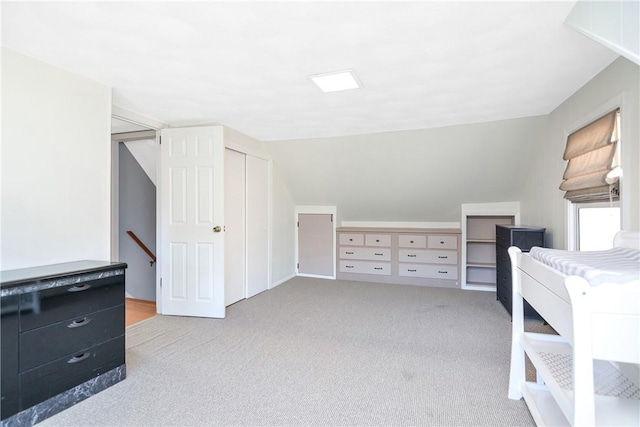 bedroom featuring light carpet