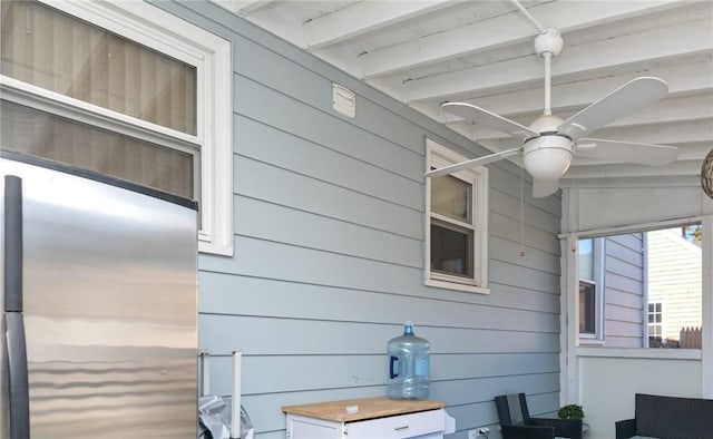 exterior details featuring stainless steel refrigerator and ceiling fan