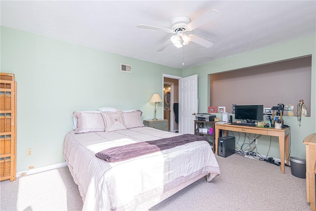 bedroom with light carpet and ceiling fan