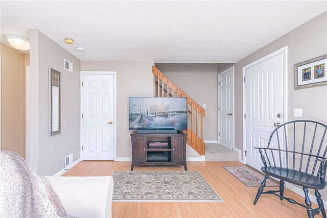 sitting room featuring light wood-type flooring