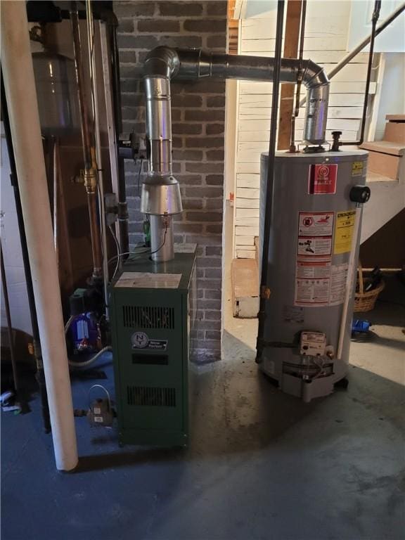 utility room featuring water heater