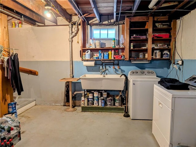 laundry room with sink and washer and dryer