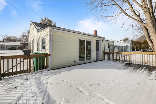 view of snow covered property