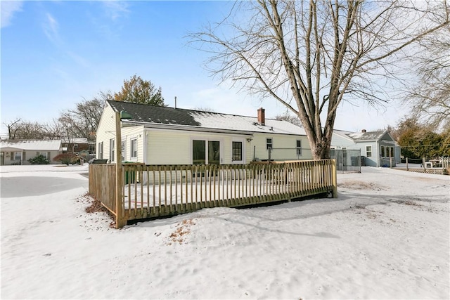 view of snow covered house