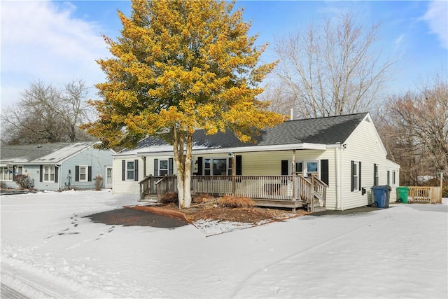 ranch-style home featuring covered porch