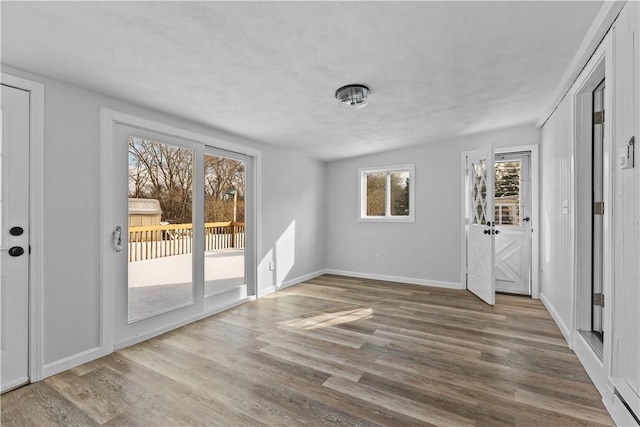 interior space with hardwood / wood-style floors