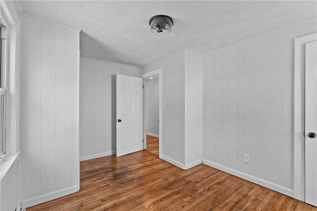 unfurnished room featuring wood-type flooring