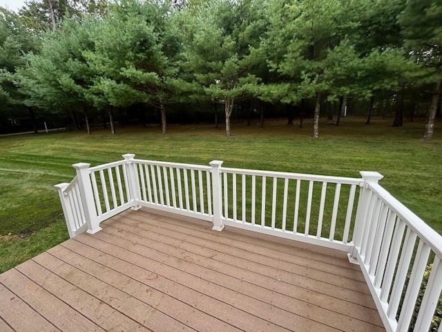 deck featuring a lawn